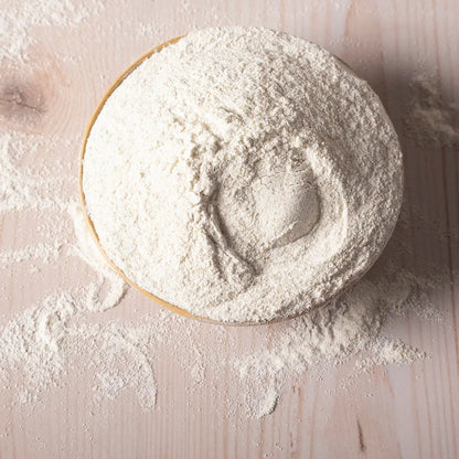 Ground buckwheat flour from Whole Food Earth, showing a close-up of the light brown, fine-textured flour in a bowl.