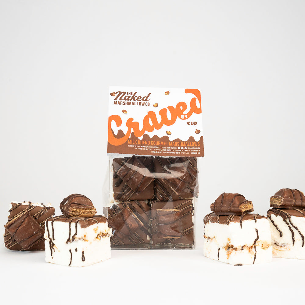 Four gourmet 'Craved' Edition marshmallows from THE MARSHMALLOW FACTORY, showcasing colorful, fluffy marshmallow treats.