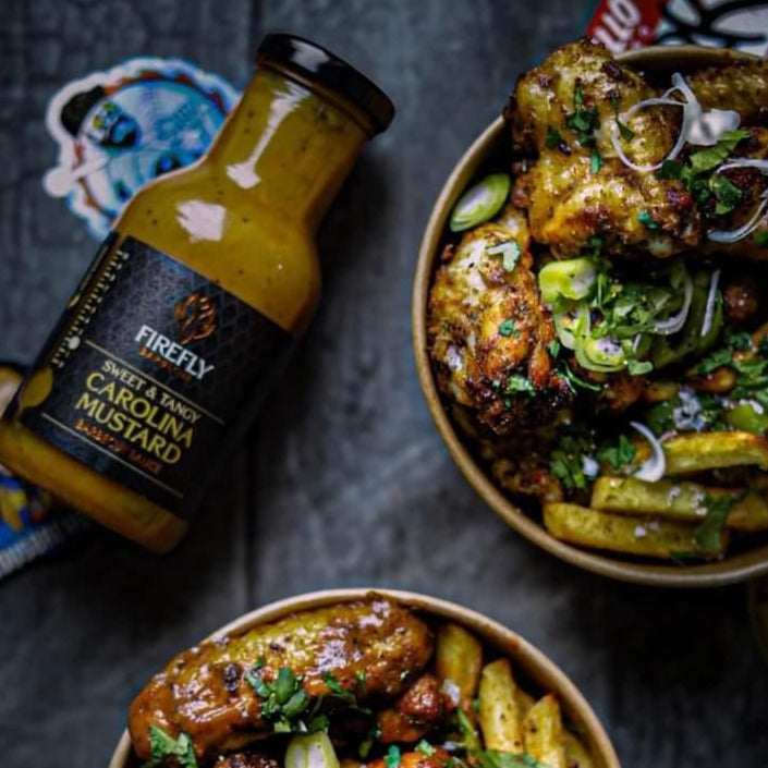 FireFly Barbecue Carolina Mustard BBQ Sauce in a jar, showcasing its smooth, golden mustard color and label design.