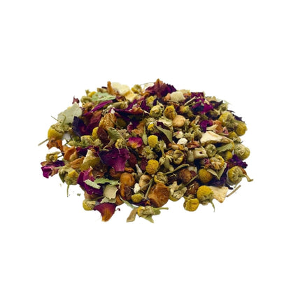 Loose leaf Peachy Chamomile tea by ArtisanBox featuring dried chamomile flowers and peach pieces in a clear jar.