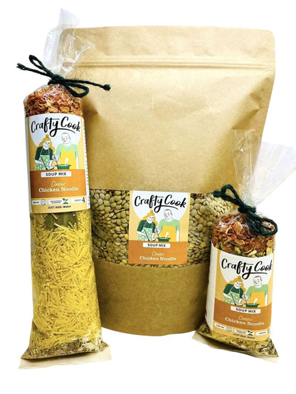Crafty Cook chicken noodle soup mix in a resealable bag, featuring colorful ingredients and a prepared bowl of chicken noodle soup.