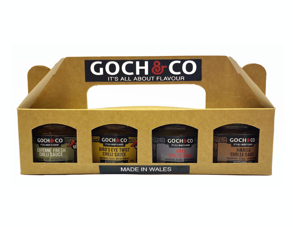 Set of four Goch & Co Goch Chilli Sauces in glass jars, showcasing vibrant chili sauces in a gift set arrangement.