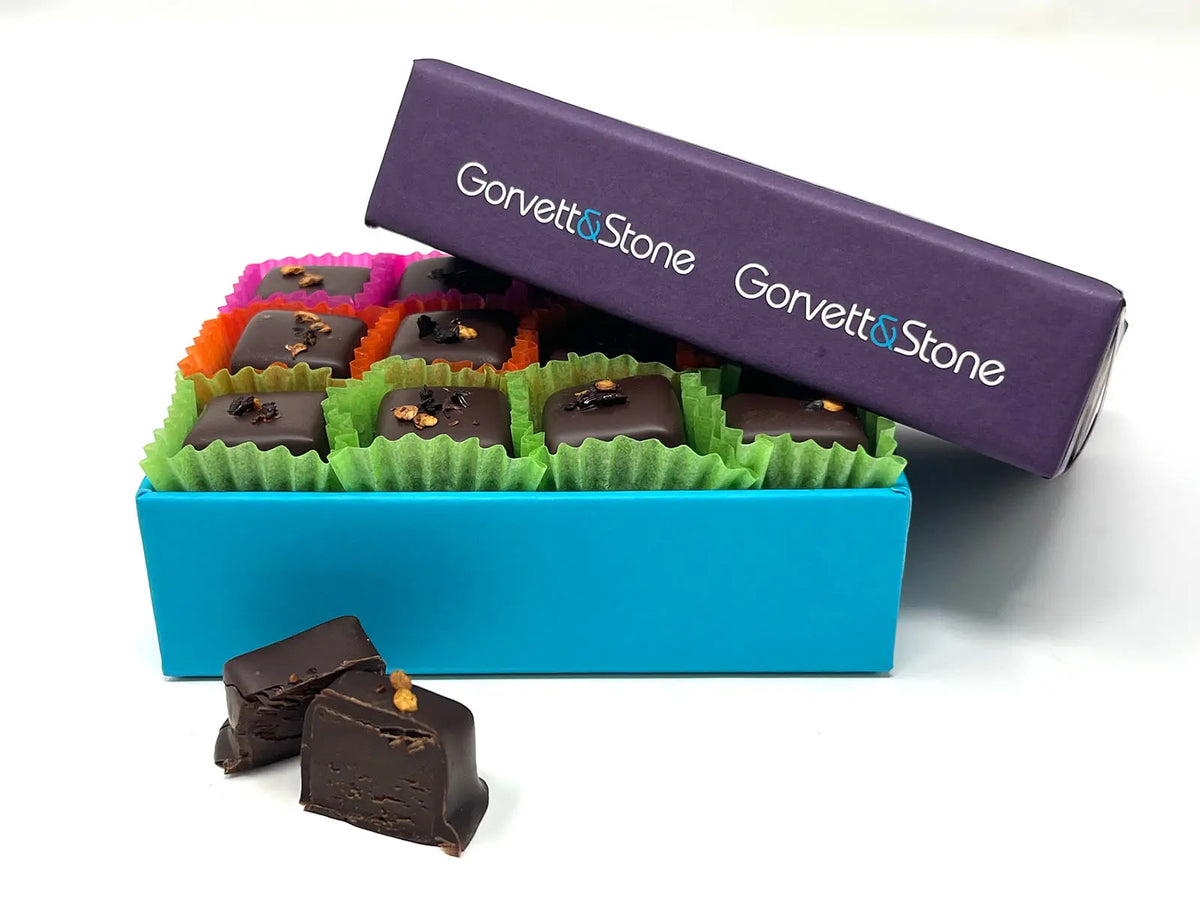 Gorvett & Stone chipotle chili chocolate box with lid, showcasing dark chocolate infused with smoky chipotle chili peppers.