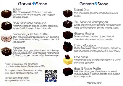 Gorvett & Stone chocolate selection box with a menu card showing an assortment of gourmet chocolates in a gift box.