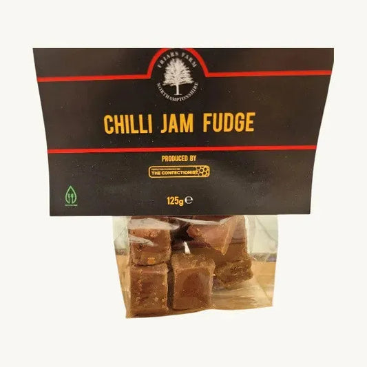 Rich chocolate fudge with a spicy chilli jam flavor from Friars Farm, shown in a close-up image of the fudge square.
