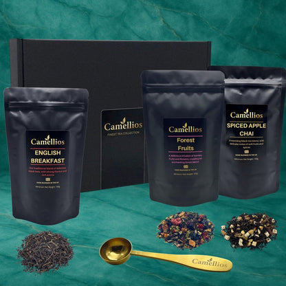Assorted luxury loose leaf teas and infusions in a gift box, featuring elegant packaging and a variety of tea blends from Camellios.