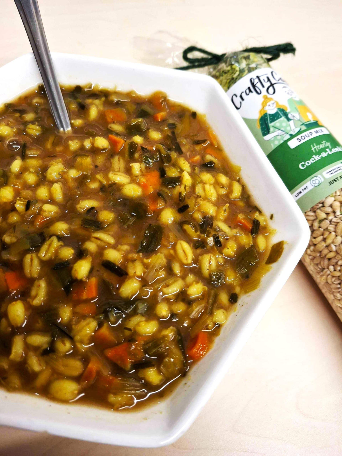 Crafty Cook Cock-a-Leekie Soup Mix in a resealable bag with ingredients visible, ready for preparing hearty soup.