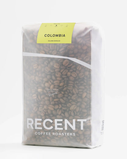 Colombia Dulima Excelso medium roast coffee beans from Recent Beans, 1kg bag showing fresh, roasted coffee beans.