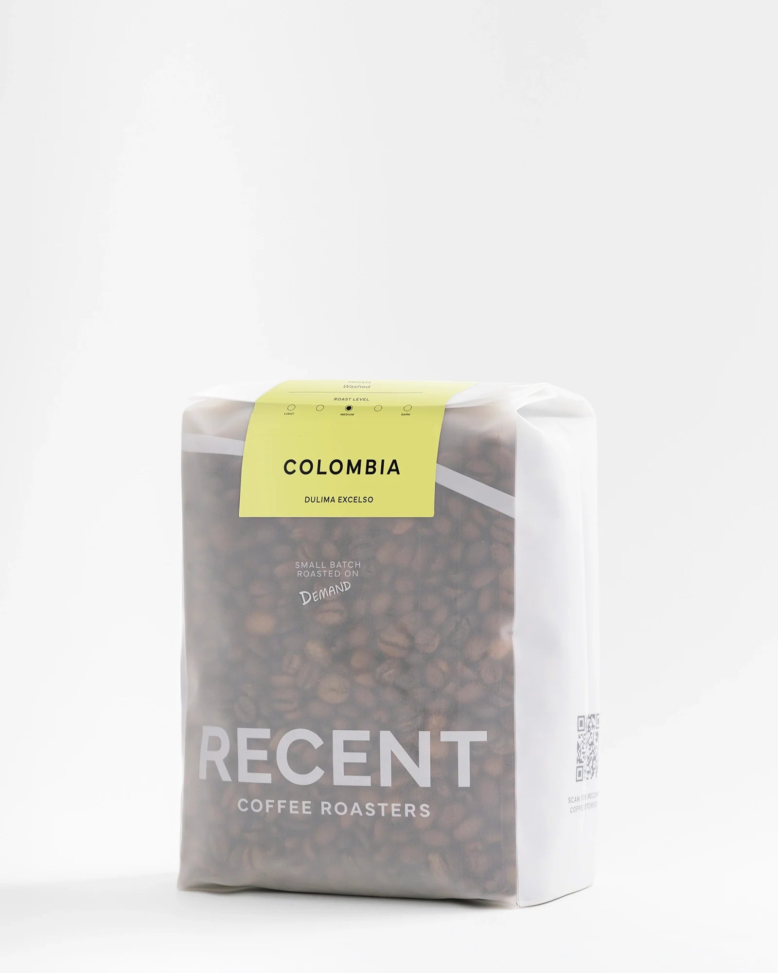 Colombia Dulima Excelso medium roast coffee beans by Recent Beans, 500g bag with roasted coffee beans visible.