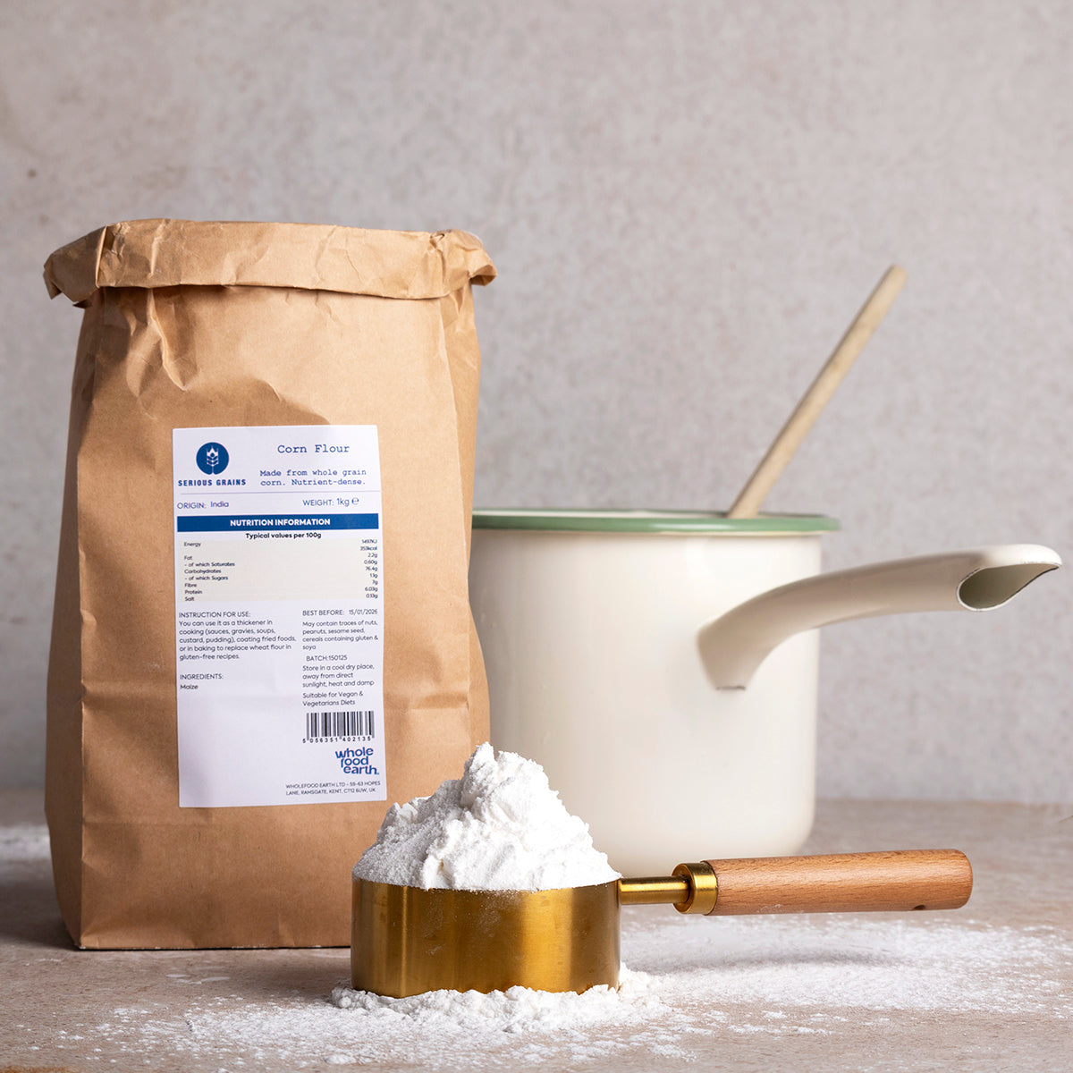 Whole Food Earth corn flour in a kitchen setting, showcasing its fine yellow texture for baking and cooking.