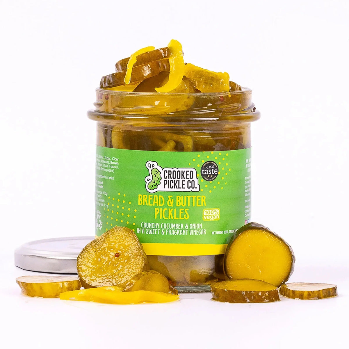 Jar of Crooked Pickle Co bread and butter pickles with sliced pickles visible inside the jar.