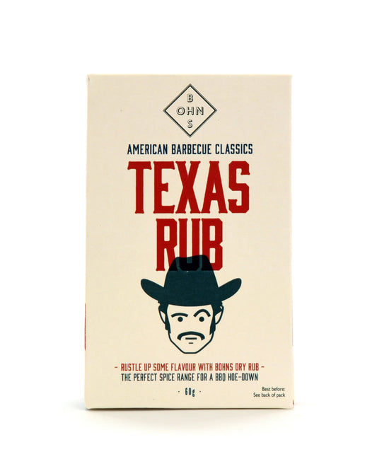 Close-up of BOHNS Rubs Texas Rub spice blend in a jar, ideal for BBQ and grilling, with a rustic background.