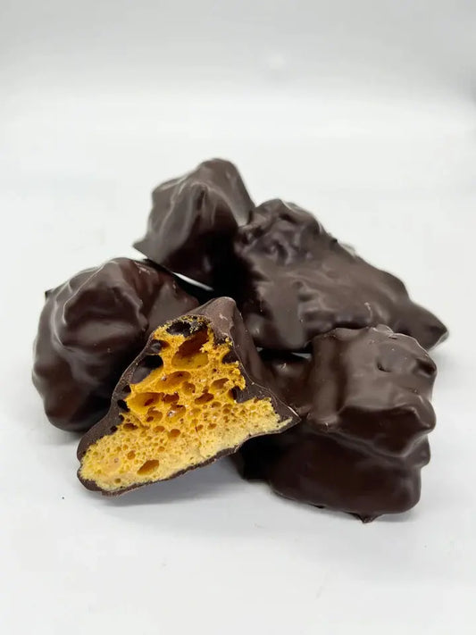 Dark chocolate cinder toffee with honeycomb pieces, handmade by Gorvett & Stone in a 250g package.