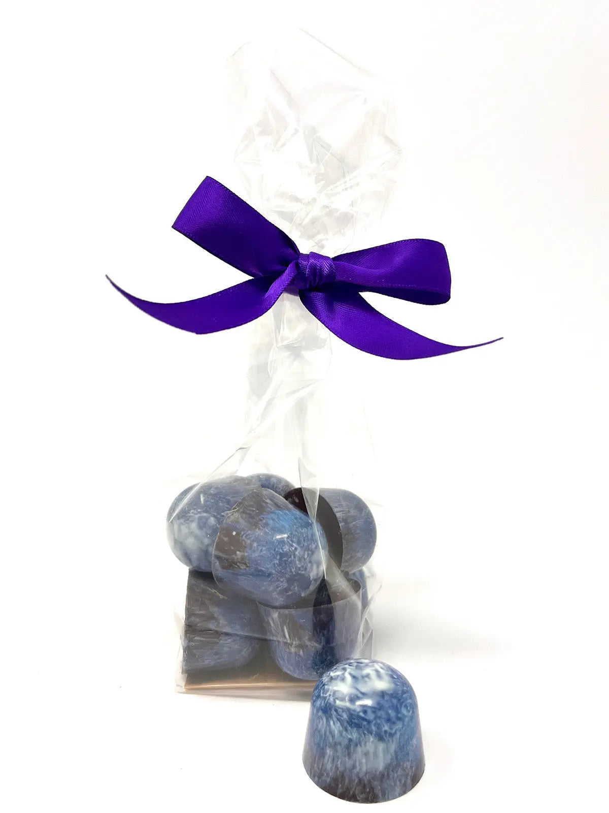 Handmade sea salt caramel chocolates in a gift box by Gorvett & Stone, featuring rich dark chocolate with sea salt accents.