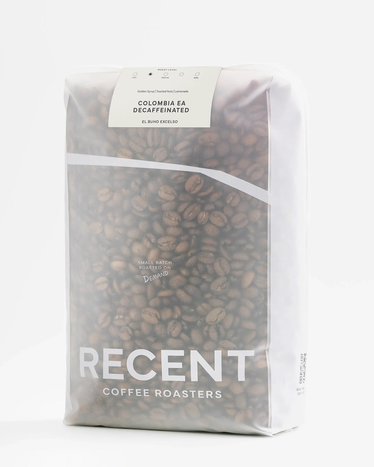 Decaf El Buho Excelso medium roast coffee beans from Recent Beans in a 1kg bag, showcasing the coffee beans in close-up.