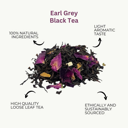 Loose leaf Earl Grey tea by Camellios with fragrant bergamot orange peels and dark tea leaves in a clear container.