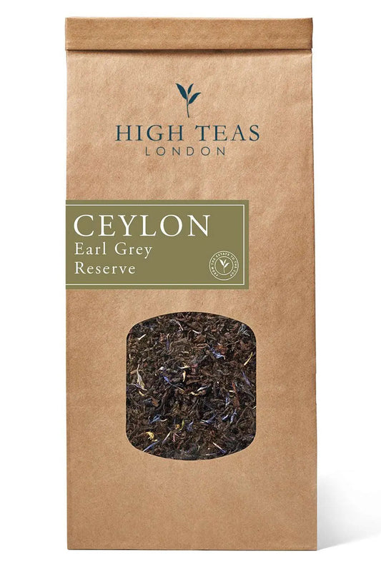 Loose leaf Earl Grey Reserve tea with cornflowers by High Teas, showing vibrant blue flowers and dark tea leaves.