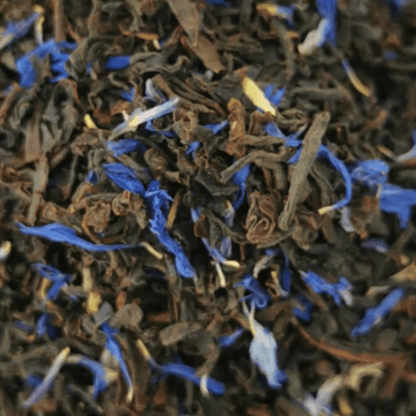 Black Earl of Colne Valley tea leaves from Porter Hill Tea Company in a clear glass jar.