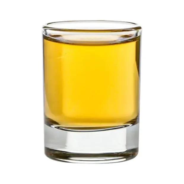 Handmade 0.15L glass decanter with two shot glasses, part of a gift set, by Glassware UK, displayed on a wooden surface.