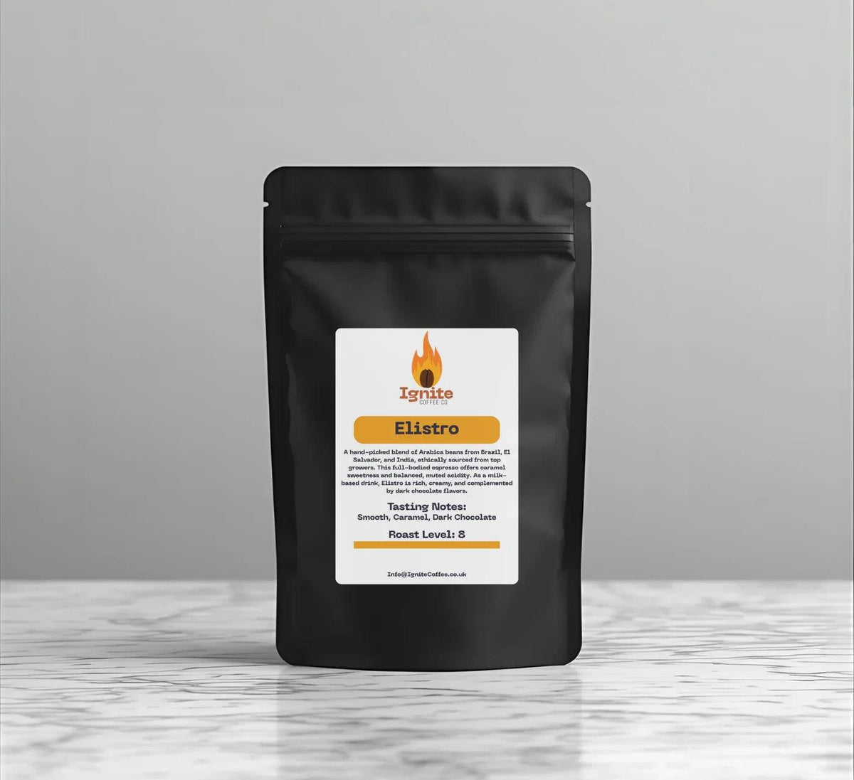 Bag of Ignite Coffee Co's Elistro Blend, a bold, creamy espresso with caramel sweetness and dark chocolate flavor.