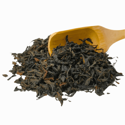 Porter Hill Tea Company Emperor Butterfly Lapsang Souchong black tea in a clear glass jar with loose tea leaves visible