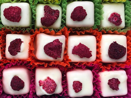 Gorvett & Stone Eton Mess chocolate gift box with a small portion of creamy Eton Mess dessert in a bowl.