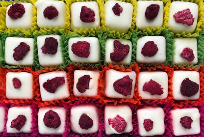 Gorvett & Stone chocolate gift box featuring Eton Mess flavored chocolates with whipped cream and berry notes in a decorative box