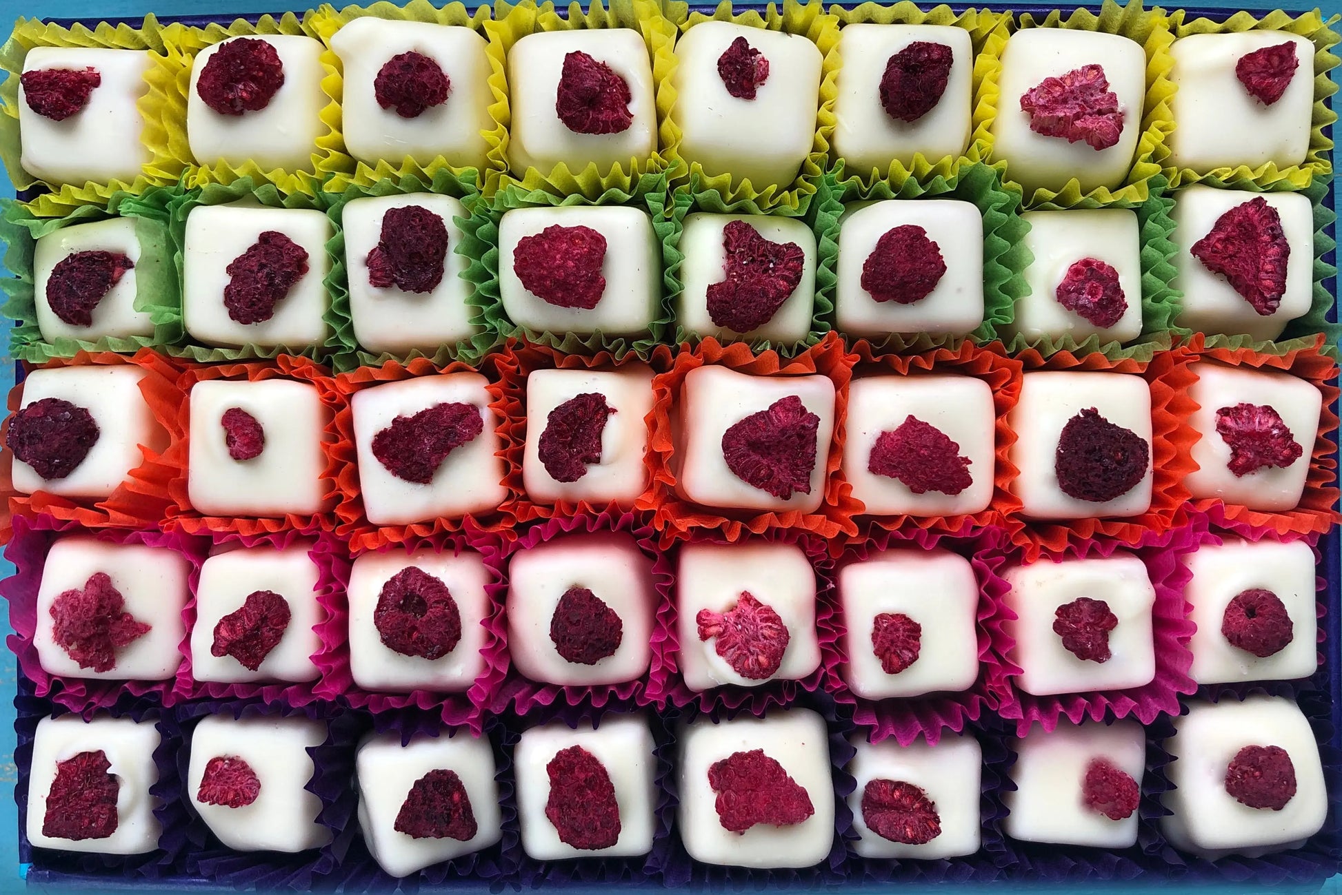 Gorvett & Stone chocolate gift box featuring Eton Mess dessert with whipped cream, strawberries, and meringue pieces.