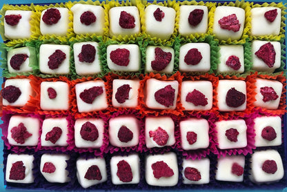 Gorvett & Stone chocolate gift box featuring Eton Mess dessert with whipped cream, strawberries, and meringue pieces.