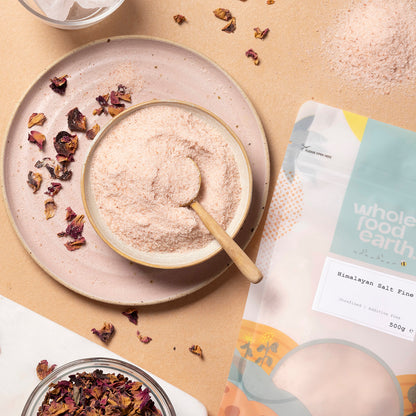 Fine Himalayan salt crystals from Whole Food Earth, showcasing a natural, flaky mineral salt suitable for culinary and seasoning use.