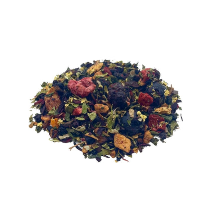 Loose leaf Forest Fruits tea by ArtisanBox showing a close-up of vibrant dried fruit and tea leaves in a clear container.