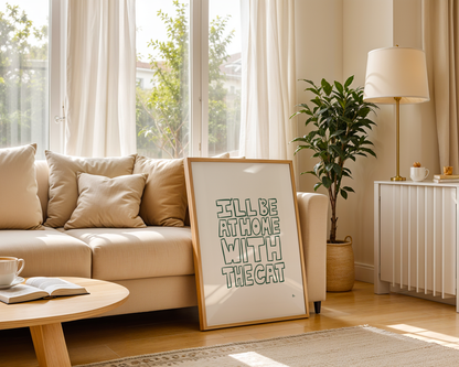Green minimalist typography print poster featuring the phrase "I'll Be At Home With The Cat," by Peak Prints, in a simple frame.