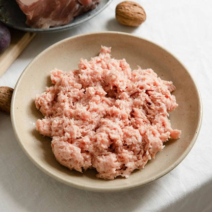 Cornish gluten-free heritage pork sausage meat by Primrose Herd, 500g, showing fresh, seasoned sausage meat in a rustic setting.