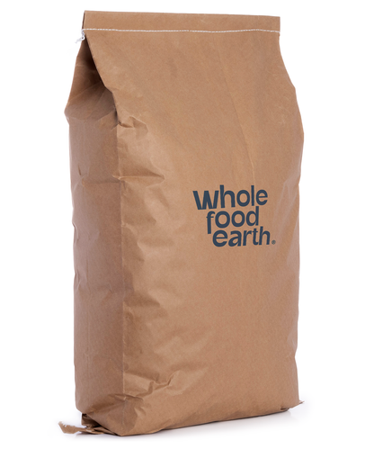 Whole Food Earth giant couscous in a clear bulk bag, showcasing the large, golden grains of this rice and couscous blend.