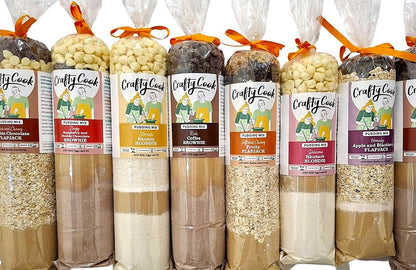 Assorted gluten-free puddings from Crafty Cook's 3 Course Meal Bundle, displayed together in a group shot.