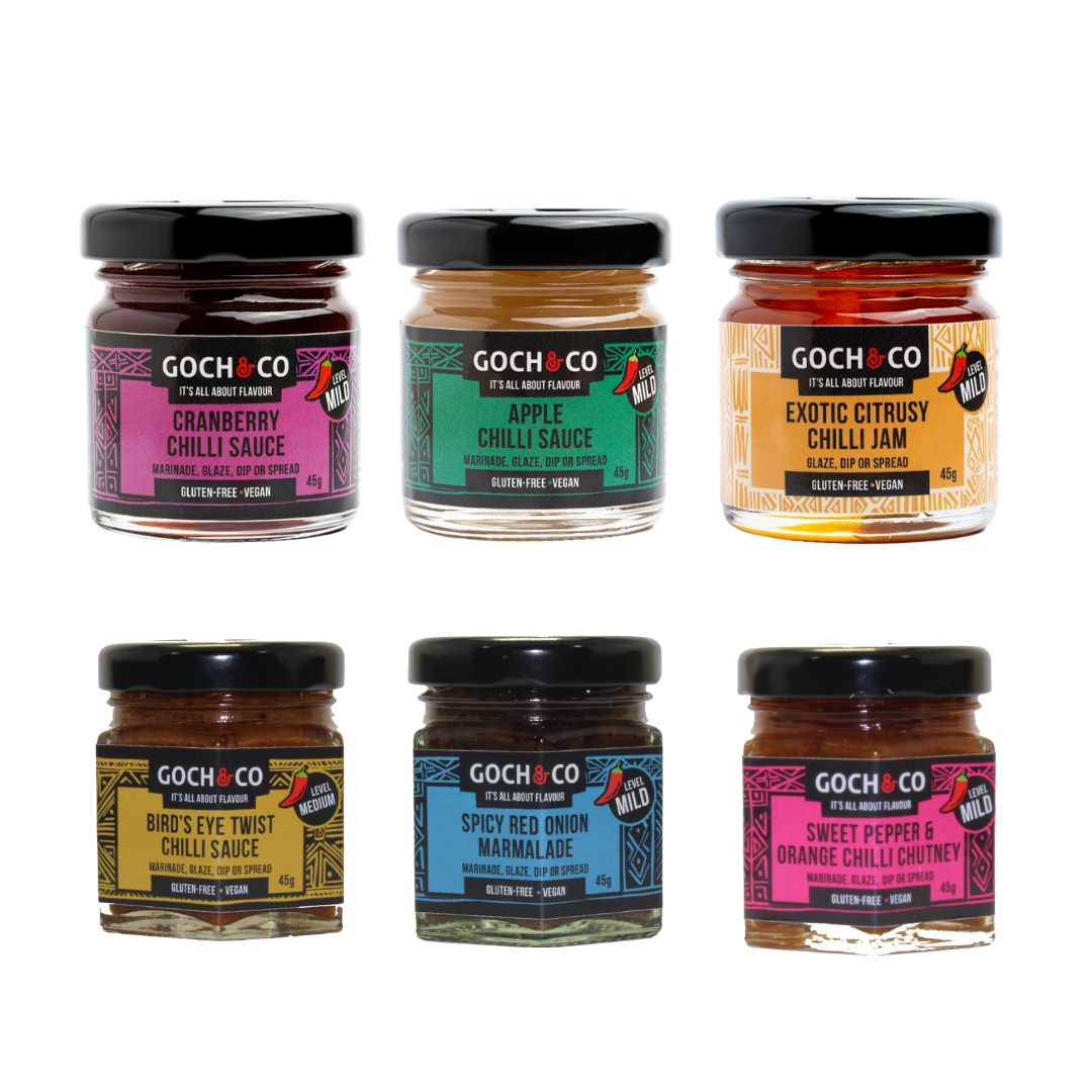 A collection of six jars of Goch & Co's award-winning chilli sauces, jams, and chutney, arranged in a grid layout against a white background.