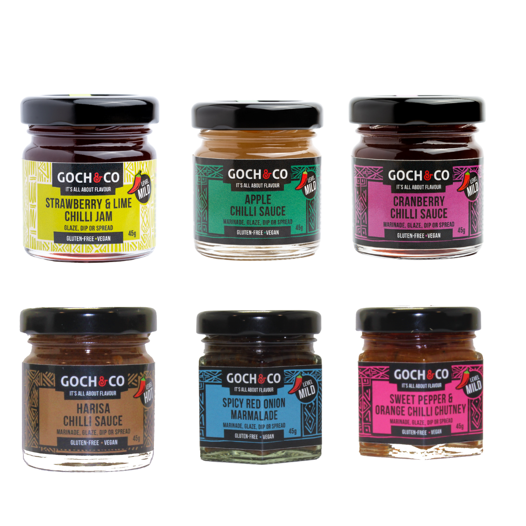 A collection of six jars of Goch & Co's award-winning chilli sauces, jams, and chutney, arranged in a grid layout against a white background.