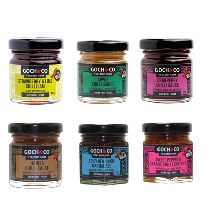 A collection of six jars of Goch & Co's award-winning chilli sauces, jams, and chutney, arranged in a grid layout against a white background.