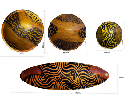 Hand carved African art wooden bowls by Goch & Co featuring intricate designs and natural wood textures, showcasing cultural craftsmanship.