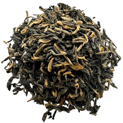Golden Heaven Yunnan black tea by Porter Hill Tea Company, brewed in a cup with golden-brown liquor and whole tea leaves.