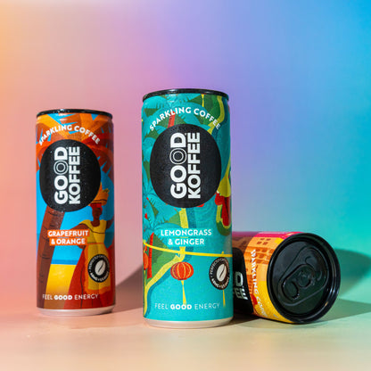 Three cans of GOOD KOFFEE sparkling coffee with one lying down on its side