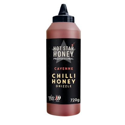 Spicy cayenne chilli honey in a 720g jar from Hot Star Honey, showcasing the golden honey with red chilli flakes.