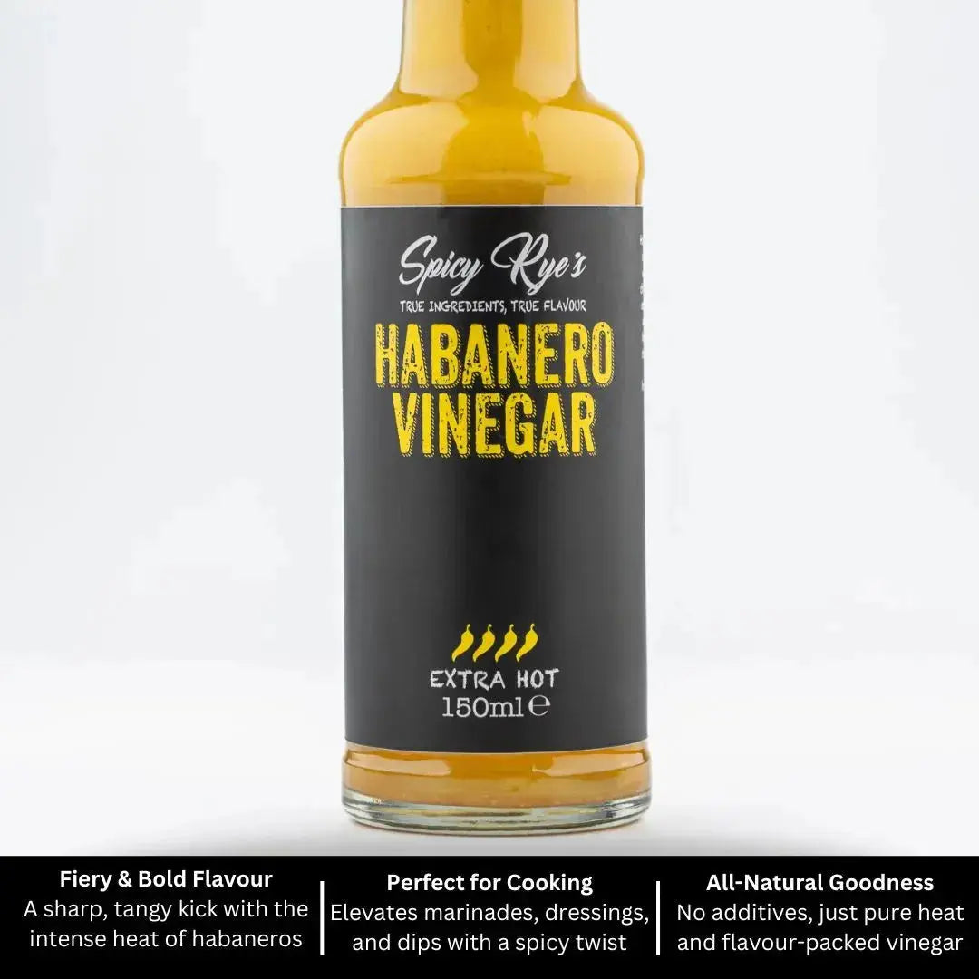 Spicy Ryes Habanero Vinegar bottle with red and orange label, showcasing the vibrant habanero pepper flavor for culinary use.