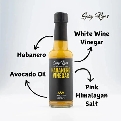 Spicy Ryes Habanero Vinegar bottle with vibrant orange label and fiery peppers, ready for culinary use.