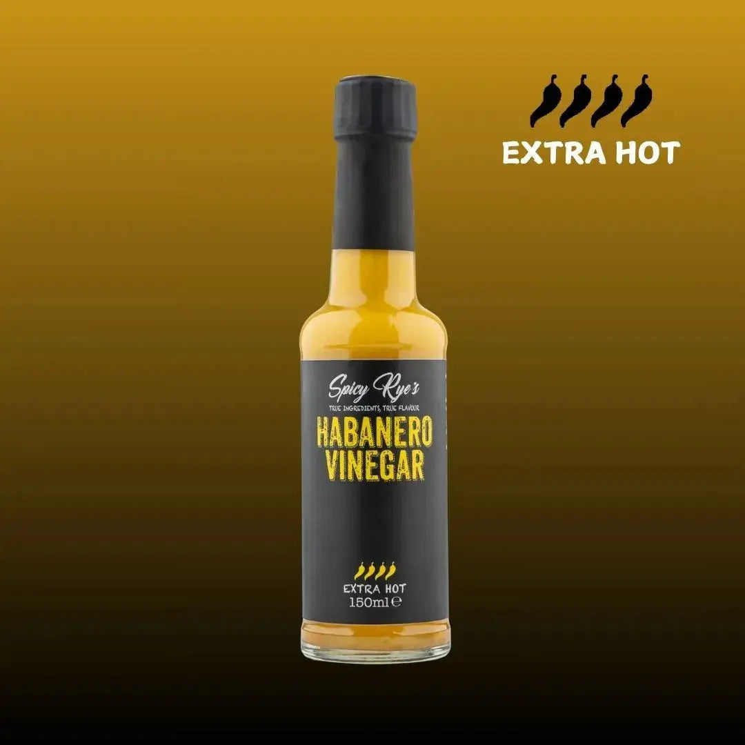 Spicy Ryes Habanero Vinegar bottle with vibrant red habanero peppers, showcasing the spicy, flavorful vinegar in a clear glass bottle.