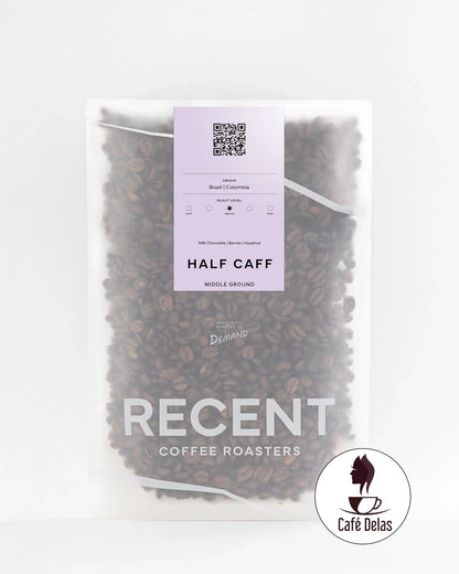 Recent Beans Middle Ground Medium Roast Coffee in a bag, showing the coffee branding and packaging design.