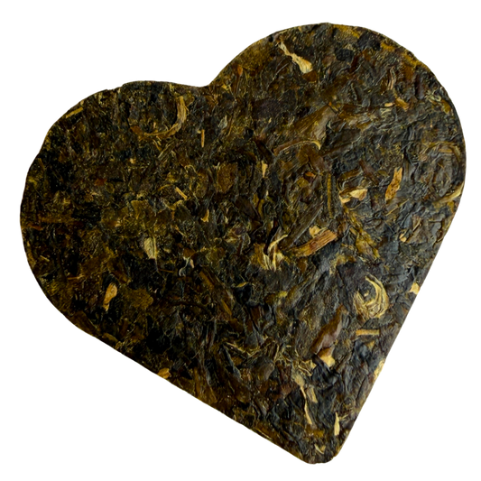 Green tea heart warmer from Porter Hill Tea Company, featuring fresh Chinese green tea leaves in a decorative packaging.