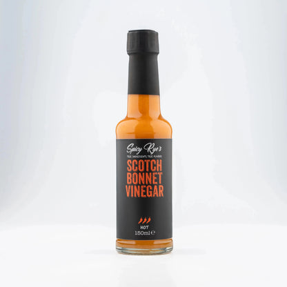 Spicy Ryes Scotch Bonnet vinegar bottle with colorful label, highlighting the fiery hot pepper flavor and vibrant branding.