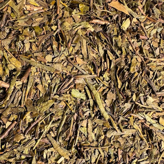 Loose leaf Hojicha green tea from Porter Hill Tea Company, Japanese roasted green tea leaves in a clear container.