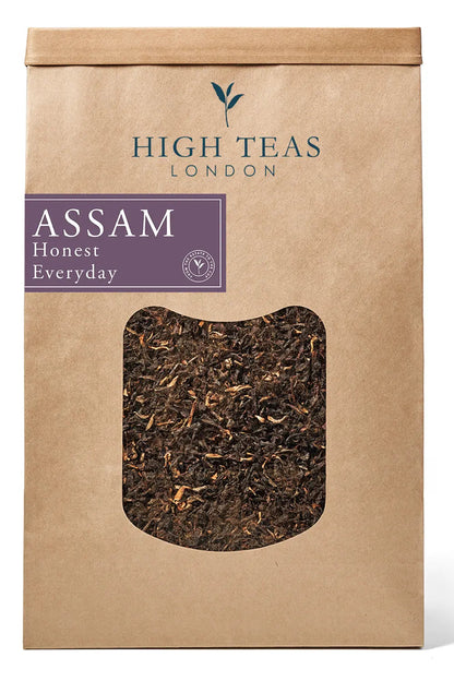 Loose leaf Honest Everyday Assam OP1 tea from High Teas featuring orange pekoe leaves in a bright packaging shot.